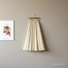 A high-end white linen and cotton skirt for women's spring and summer, a mid-length loose and slimming long skirt with a large swing Application Scenario